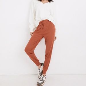 Madewell Slim Breeze Joggers in Afterglow Red.